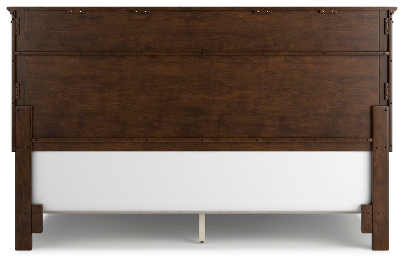 Ashley Furniture Danabrin Bed with a dark wood finish, showcasing a sturdy frame and classic design for a cozy bedroom setting.