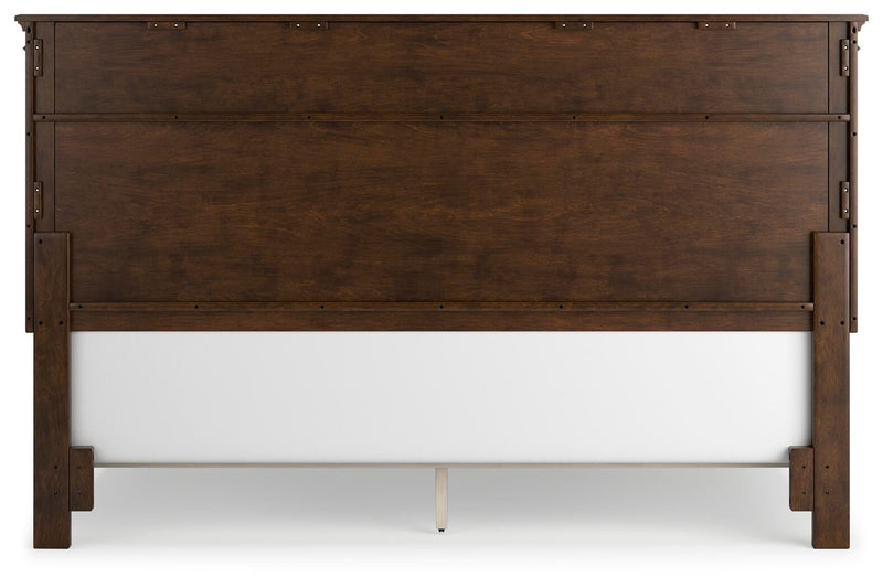Ashley Furniture Danabrin Bed with dark wood finish and classic design, shown from the back in a well-lit room setting.