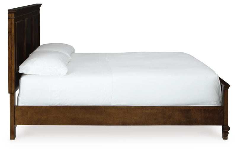 Ashley Furniture Danabrin Bed with a wooden frame and side view, showcasing its elegant design and sturdy construction.