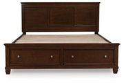 Ashley Furniture Danabrin Panel Storage Bed with a headboard and storage drawers in a modern bedroom setting