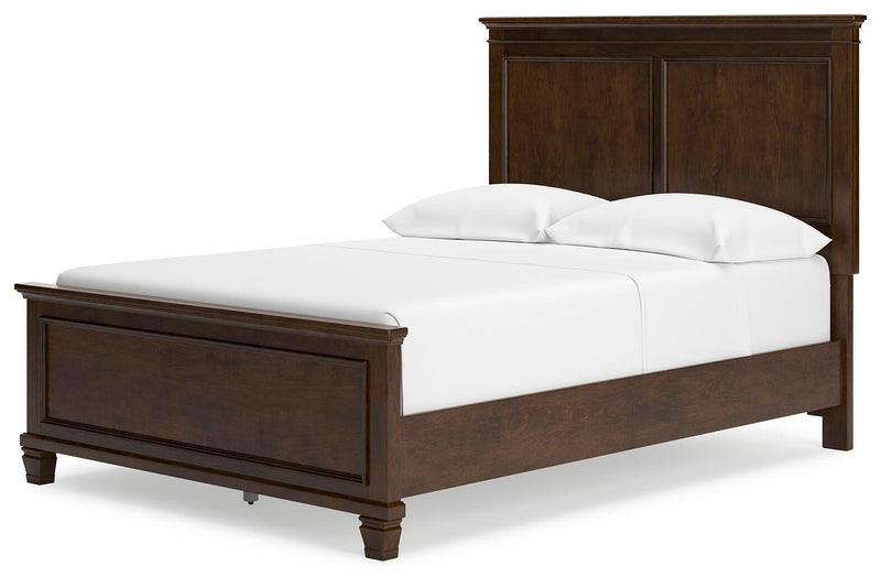 Ashley Furniture Danabrin Bed with a stylish frame and headboard, shown from an angled perspective in the image.