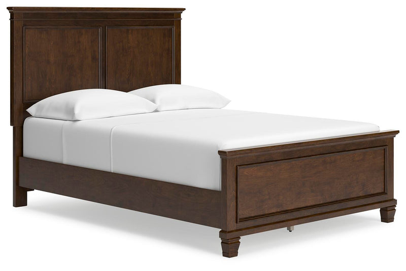 Ashley Furniture Danabrin Bed with a modern frame, featuring a sleek headboard and stylish design in a bedroom setting.