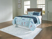 Ashley Furniture Danabrin Panel Storage Bed with sleek wood finish and built-in storage drawers in a modern bedroom setting