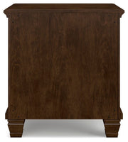 Ashley Furniture Danabrin Nightstand with a dark wood finish, featuring a single drawer and open shelf for bedroom storage.