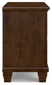 Ashley Furniture Danabrin nightstand with a dark wood finish and a single drawer, featuring a sleek, modern design.