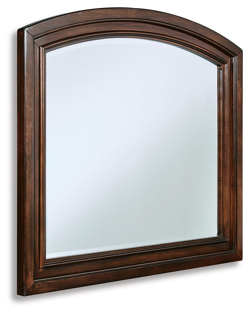 Ashley Furniture Porter bedroom mirror with a sleek, modern design shown from an angled view.