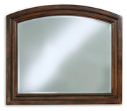 Ashley Furniture Porter bedroom mirror reflecting a sleek, modern design with a wooden frame, ideal for bedroom decor.