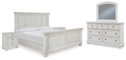 Ashley Furniture Robbinsdale bedroom set with a bed, nightstands, and dresser featuring modern wood finish and stylish hardware.