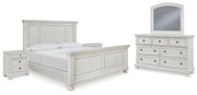 Ashley Furniture Robbinsdale bedroom set with a bed, nightstands, and dresser in a modern, stylish bedroom arrangement.