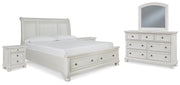 Ashley Furniture Robbinsdale bedroom set with a wooden bed frame, matching nightstands, and a dresser in a cozy bedroom setting.