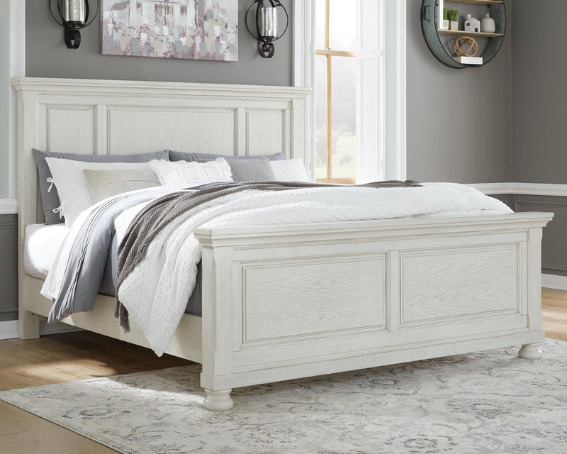 Ashley Furniture Robbinsdale bedroom set featuring a bed, nightstands, and dresser in a modern, elegant bedroom design.