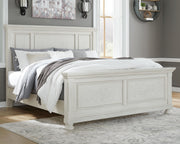 Ashley Furniture Robbinsdale bedroom set with a stylish bed frame, matching nightstands, and bedroom decor in a cozy room setting.