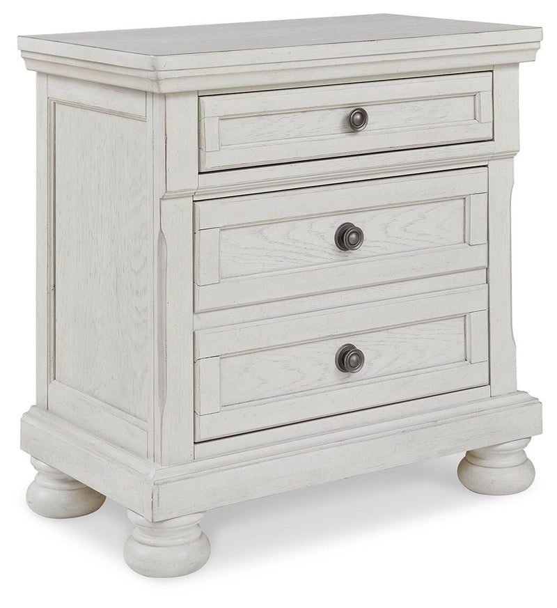 Ashley Furniture Robbinsdale bedroom set with a closed view of the bed, dresser, and nightstands in a modern bedroom setting.