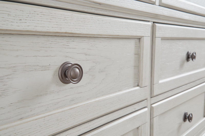 Ashley Furniture Robbinsdale bedroom set with a close-up of the handle detail on the dresser in a stylish bedroom scene.
