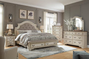 Realyn bedroom set by Ashley Furniture featuring a modern bed frame, matching nightstands, and a stylish dresser in a cozy bedroom setting.