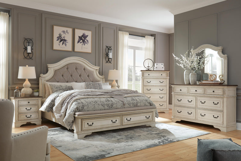 Realyn bedroom set by Ashley Furniture featuring a modern bed frame, matching nightstands, and a stylish dresser in a cozy bedroom setting.