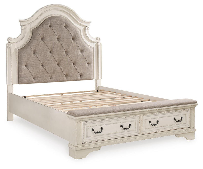 Ashley Furniture Realyn upholstered bed with padded headboard and neutral fabric, shown in a stylish bedroom setting.
