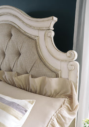 Ashley Furniture Realyn bedroom set with a modern bed frame, matching nightstands, and elegant bedroom decor.