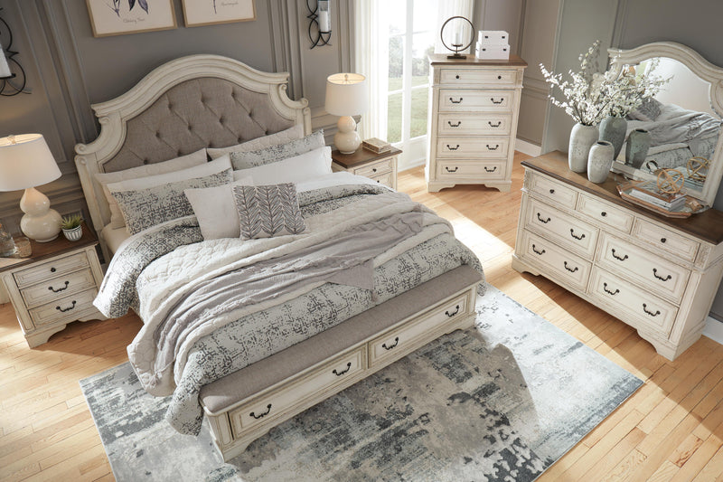 Ashley Furniture Realyn upholstered bed with plush fabric, tufted headboard, and sleek design in a modern bedroom setting.