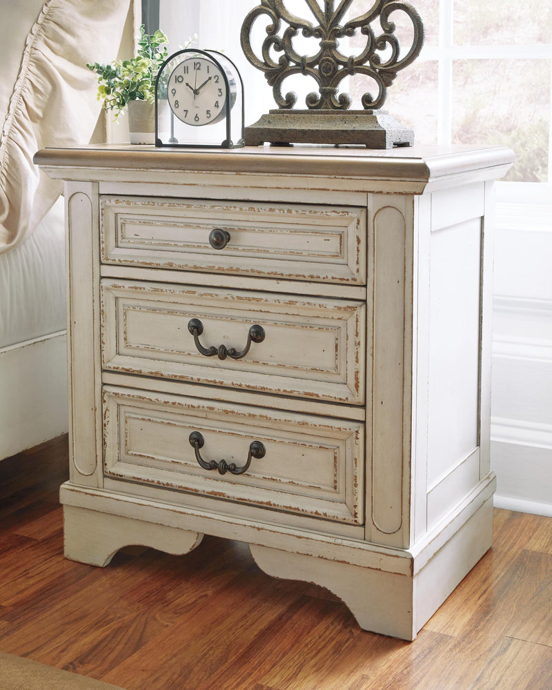 Ashley Furniture Realyn bedroom set featuring a bed frame, nightstands, and matching dresser in a modern bedroom decor.