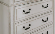 Close-up of Ashley Furniture Blendon Dresser with detailed handle design and wood finish.