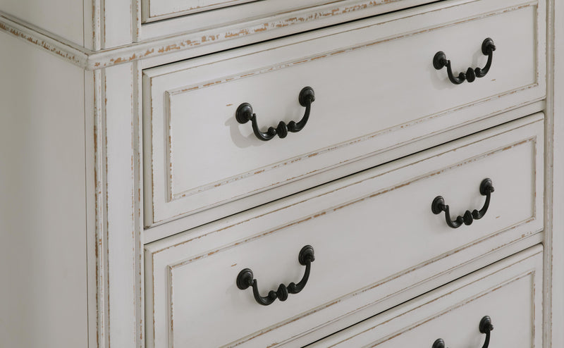 Close-up of Ashley Furniture Blendon Dresser with detailed handle design and wood finish.