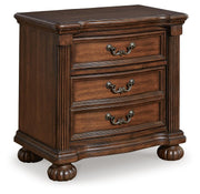 Ashley Furniture Lavinton bedroom set with a bed, matching nightstands, and dresser, shown from an angled close-up view.
