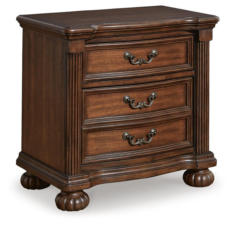 Ashley Furniture Lavinton bedroom set with a bed, matching nightstands, and dresser, shown from an angled close-up view.