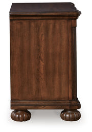 Ashley Furniture Lavinton bedroom set with a bed, nightstands, and dresser arranged in a cozy, modern bedroom scene.