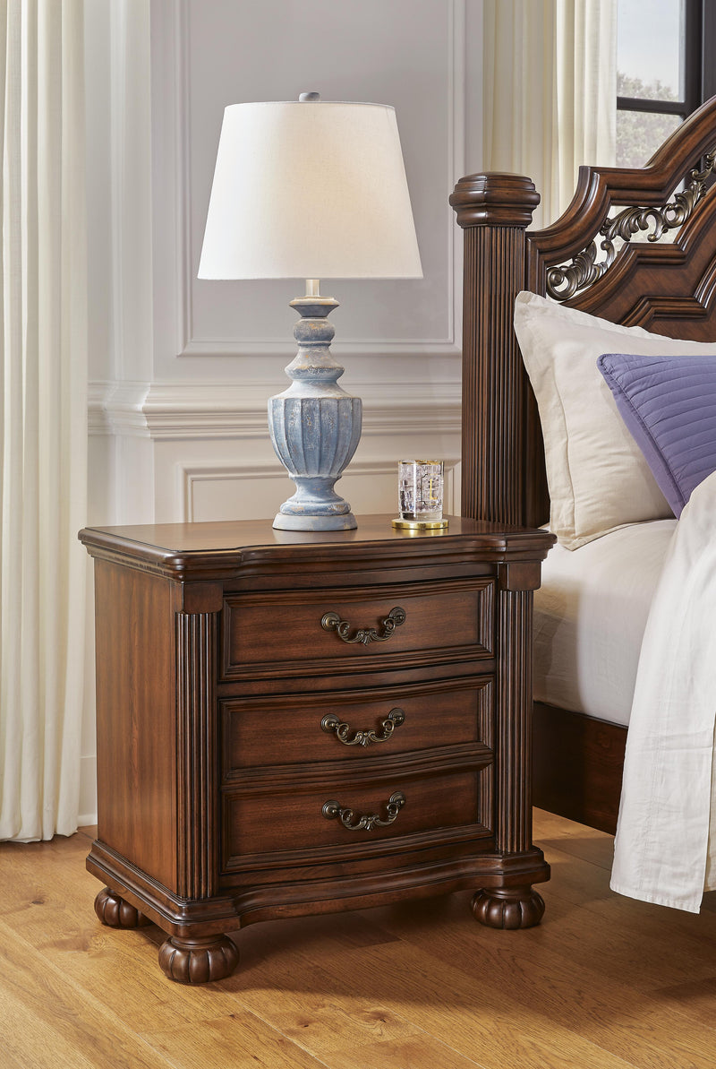 Ashley Furniture Lavinton bedroom set with a modern bed frame, matching nightstands, and dresser in a stylish bedroom display.