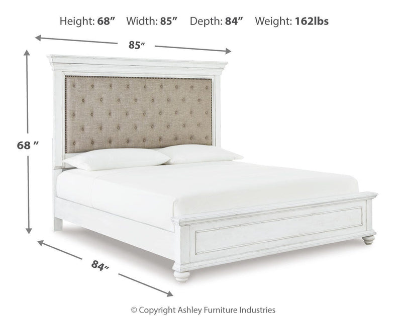 Ashley Furniture Kanwyn bedroom set featuring a bed, matching nightstands, and dresser in a modern bedroom design.