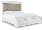 Ashley Furniture Kanwyn bedroom set with a bed frame, nightstands, and dresser shown from an angled view in a stylish bedroom.