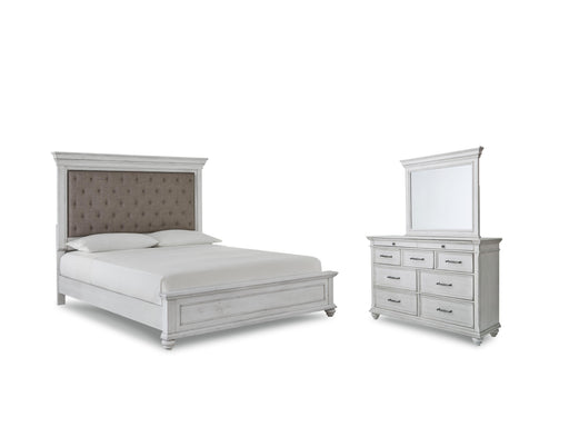 Ashley Furniture Kanwyn bedroom set with a wood bed frame, matching nightstands, and dresser in a modern bedroom design.