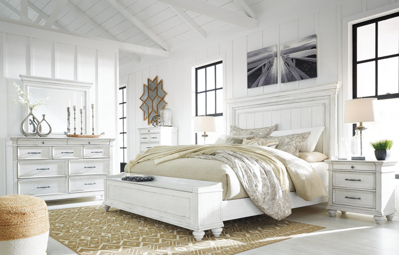 Ashley Furniture Kanwyn bedroom set featuring a bed frame, matching nightstands, and dresser with modern design and neutral finishes.