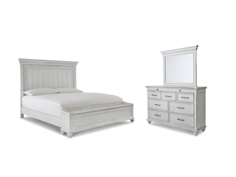 Ashley Furniture Kanwyn bedroom set featuring a bed, nightstands, and matching dresser with elegant wood finish.