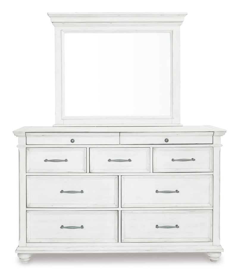 Ashley Furniture Kanwyn bedroom set featuring a bed with a headboard, matching nightstands, and a dresser in a modern bedroom scene.