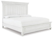 Ashley Furniture Kanwyn bedroom set featuring a bed, nightstands, and dresser with a modern design in a stylish bedroom scene.