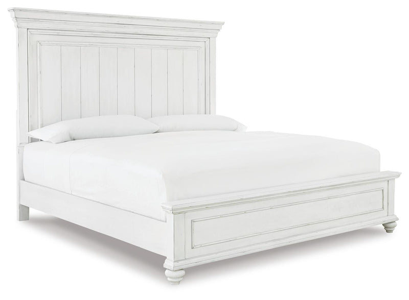 Ashley Furniture Kanwyn bedroom set featuring a bed, nightstands, and dresser with a modern design in a stylish bedroom scene.