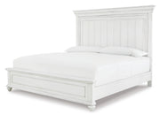 Ashley Furniture Kanwyn bedroom set with a bed, dresser, and nightstands arranged in a modern bedroom scene.