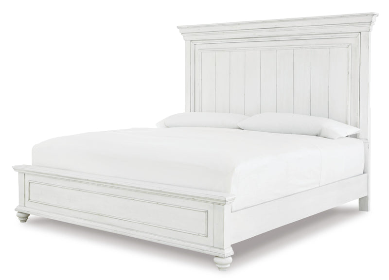 Ashley Furniture Kanwyn bedroom set with a bed, dresser, and nightstands arranged in a modern bedroom scene.