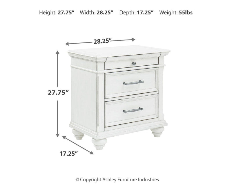 Ashley Furniture Kanwyn bedroom set featuring a stylish bed, matching nightstands, and coordinating bedroom furniture.