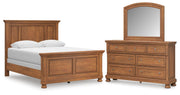 Ashley Furniture Feddinger Bedroom Set featuring a bed frame, nightstands, and dresser in a modern bedroom design.