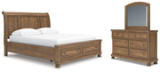 Ashley Furniture Feddinger bedroom set with a modern bed frame, matching nightstands, dresser, and mirror in a stylish bedroom setup.