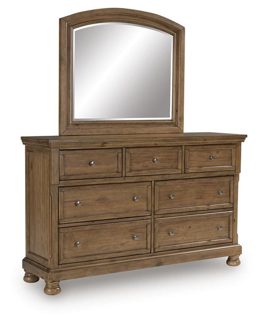 Ashley Furniture Feddinger dresser and mirror set with a sleek wooden dresser and matching mirror, shown from an angled view.