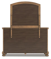 Ashley Furniture Feddinger bedroom set including a bed, dresser, and nightstands with a modern design and neutral finish.