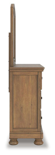 Ashley Furniture Feddinger bedroom set with matching bed frame, nightstands, and dresser in a modern bedroom setup.