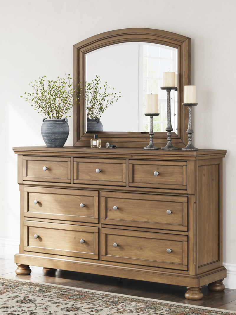 Ashley Furniture Feddinger bedroom set with a modern bed frame, matching nightstands, and a stylish dresser in a cozy bedroom scene.