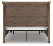 Ashley Furniture Feddinger bedroom set with a bed frame, nightstands, and dresser in a modern bedroom setting.