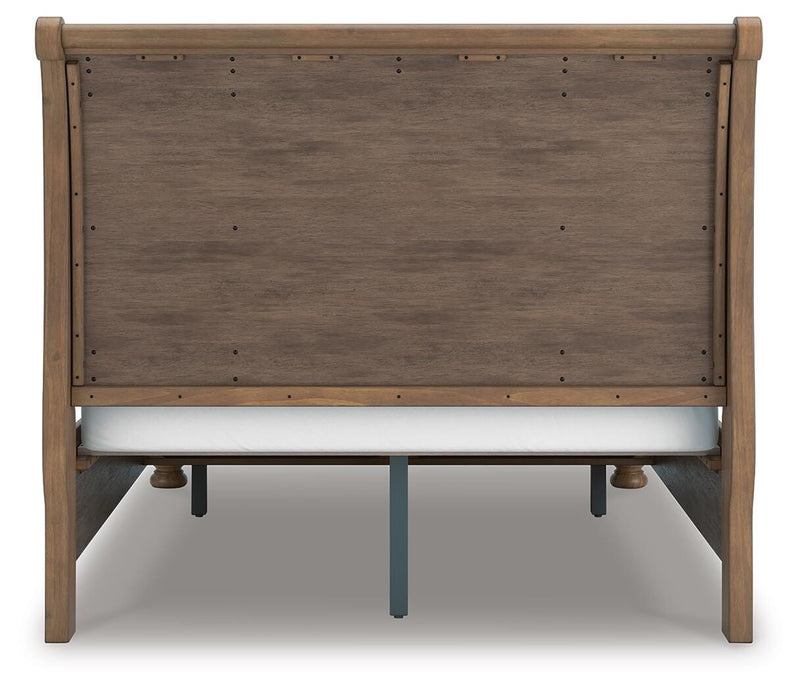 Ashley Furniture Feddinger bedroom set with a bed frame, nightstands, and dresser in a modern bedroom setting.