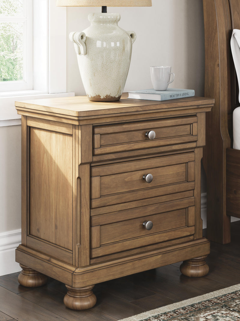 Ashley Furniture Feddinger bedroom set featuring a bed, nightstands, and dresser in a modern bedroom design.